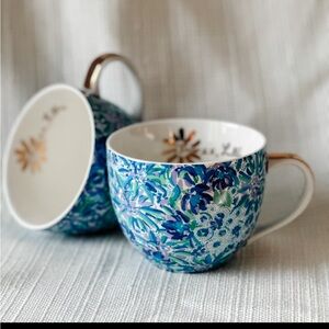 Lily Pulitzer floral coffee mugs with hidden lion face and gold handle